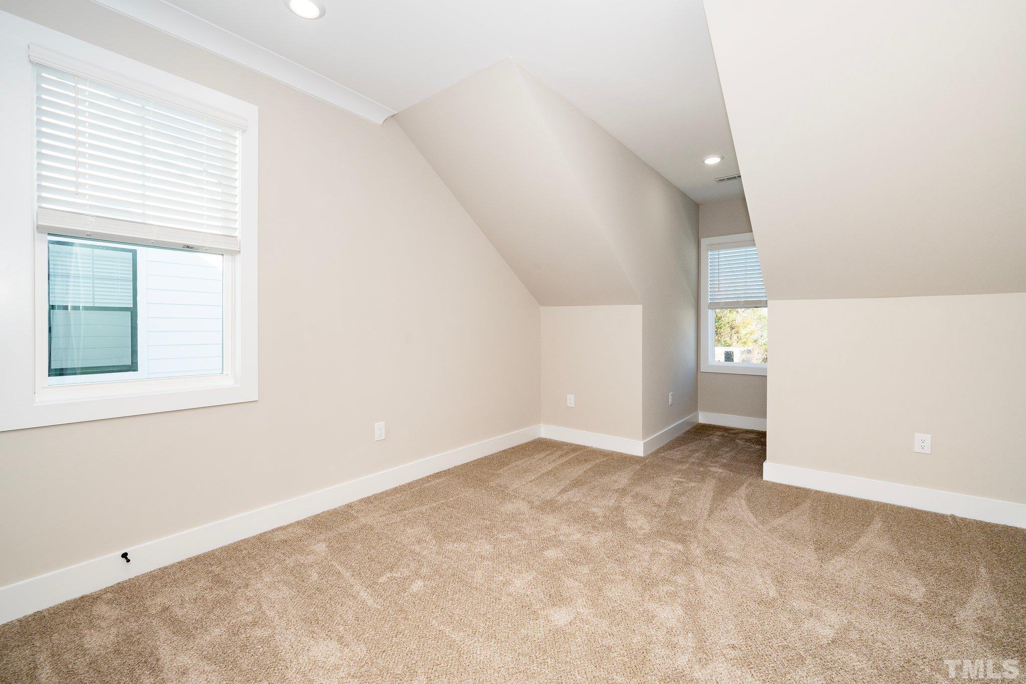 6104 Fox Raleigh, NC 27616 - Photo 47 of 54 an empty room with windows