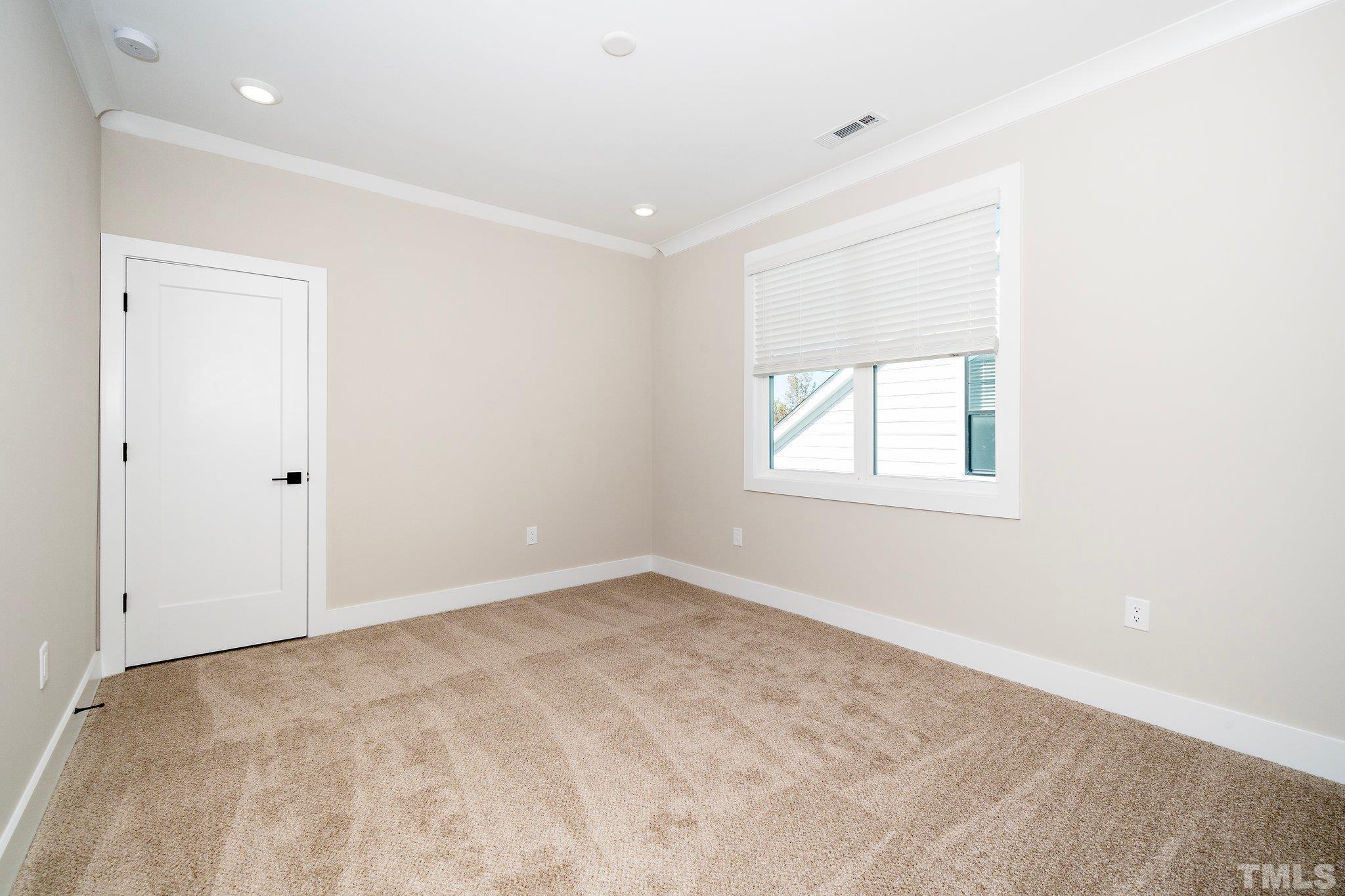 6104 Fox Raleigh, NC 27616 - Photo 48 of 54 an empty room with windows