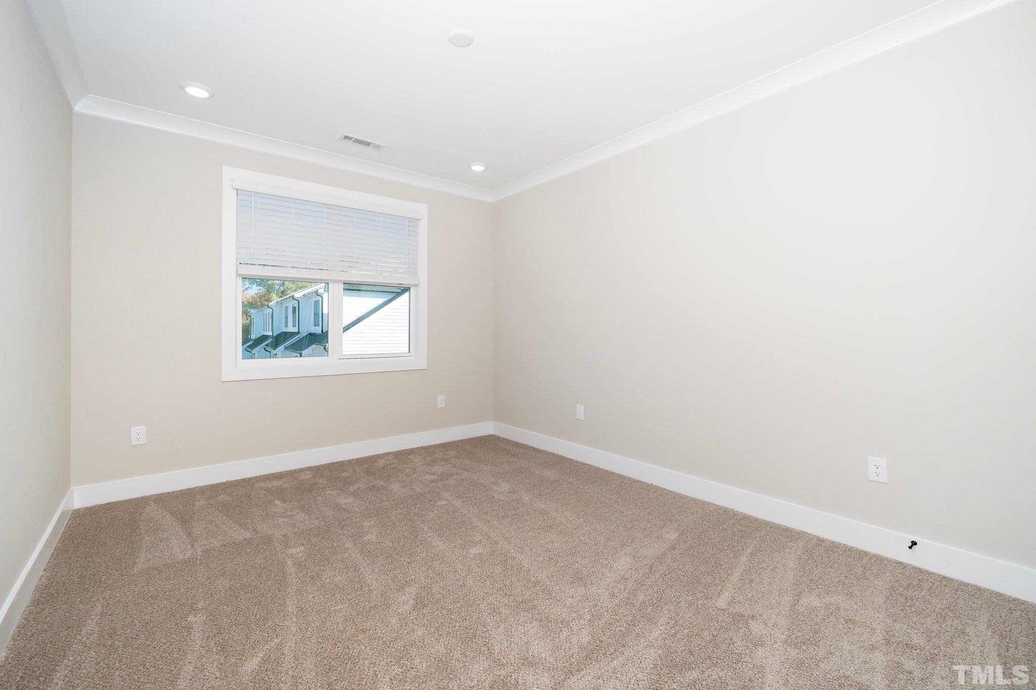 6104 Fox Raleigh, NC 27616 - Photo 49 of 54 an empty room with a window