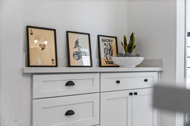 a bedroom with a large bed and a couch