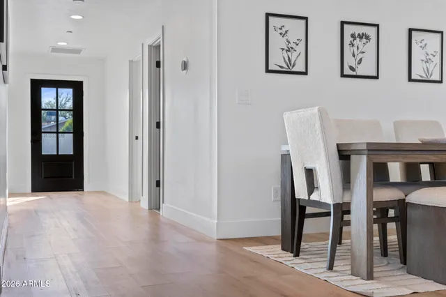 a bedroom with a bed and a table in it