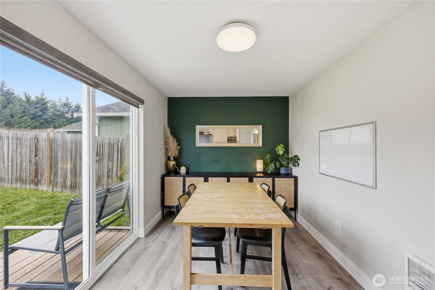110 Alpine Loop Sequim, WA 98382 - Photo 11 of 36 a view of a dining room with furniture window and wooden floor