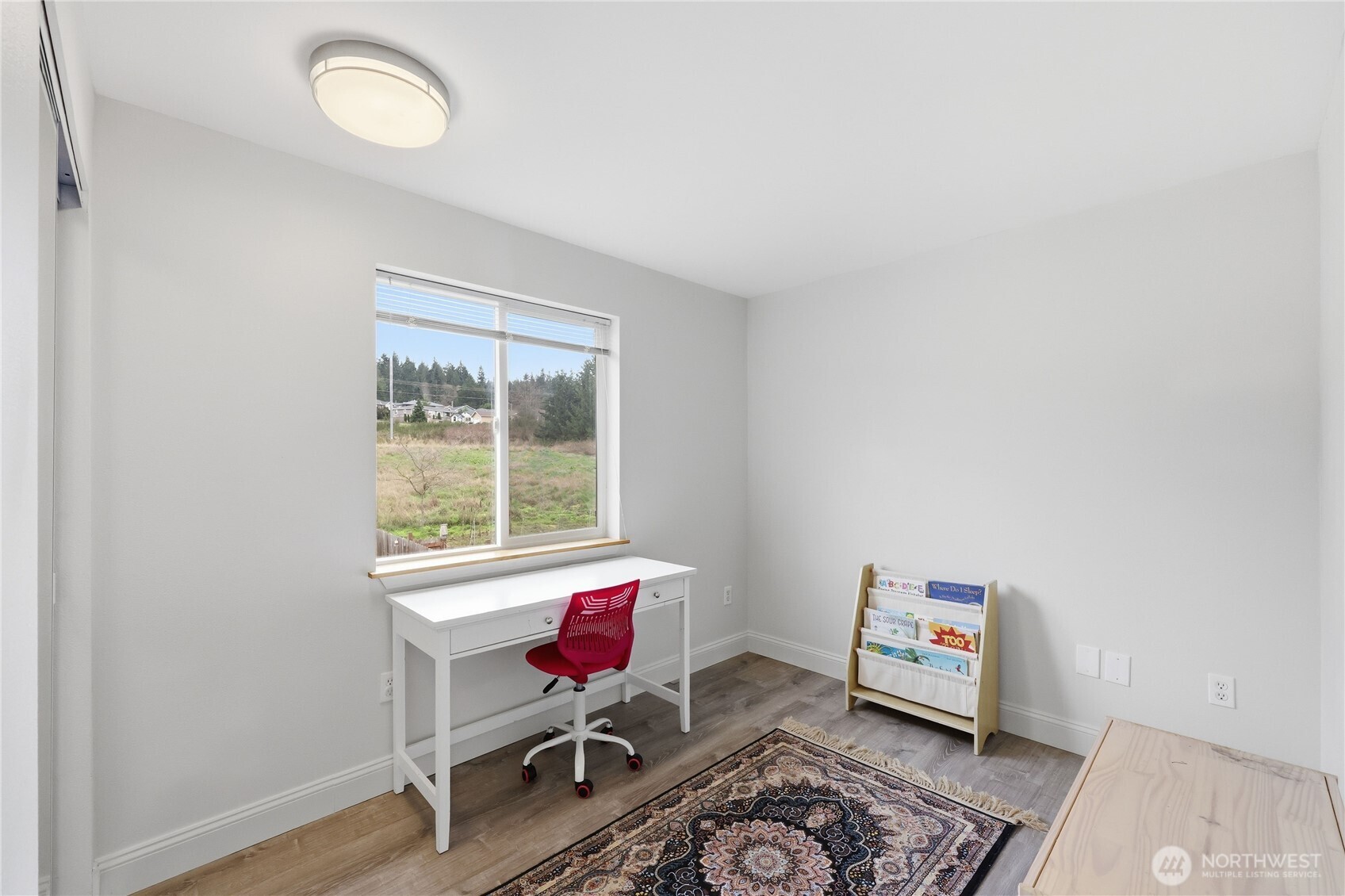 110 Alpine Loop Sequim, WA 98382 - Photo 18 of 36 a room with furniture and a window