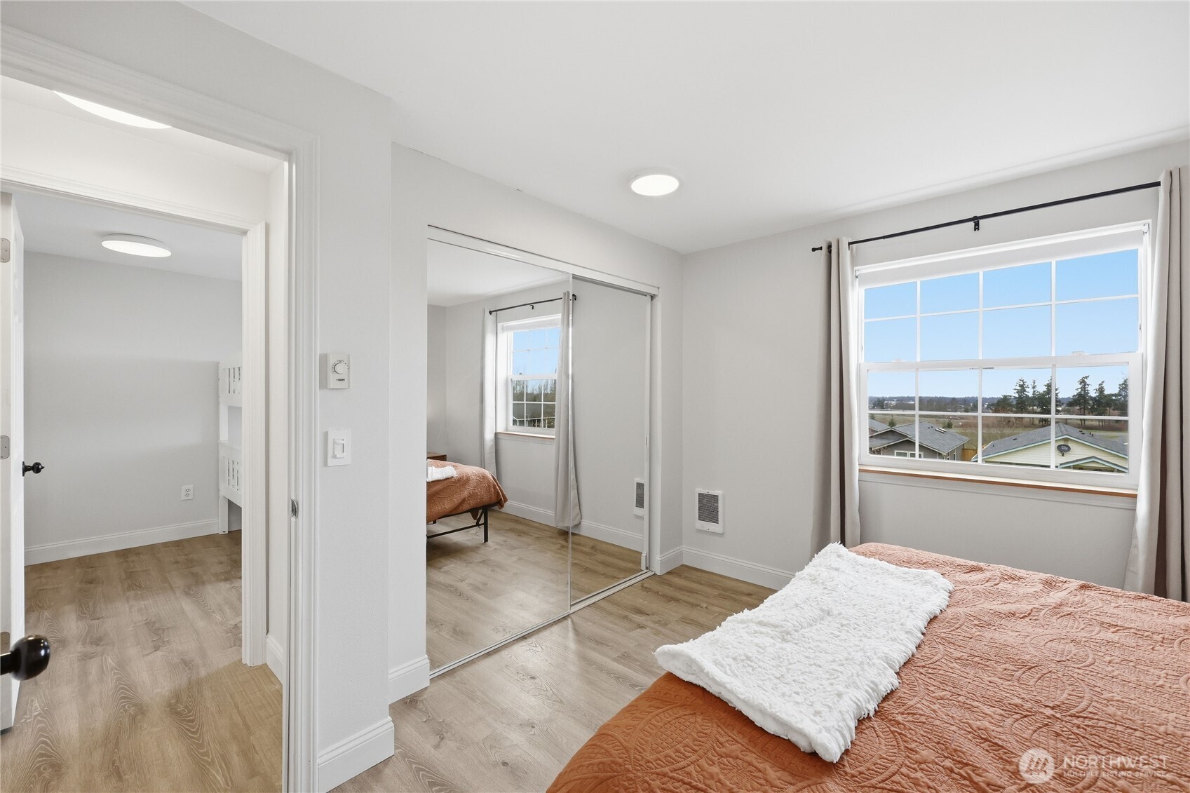 110 Alpine Loop Sequim, WA 98382 - Photo 25 of 36 a bedroom with a bed and a window