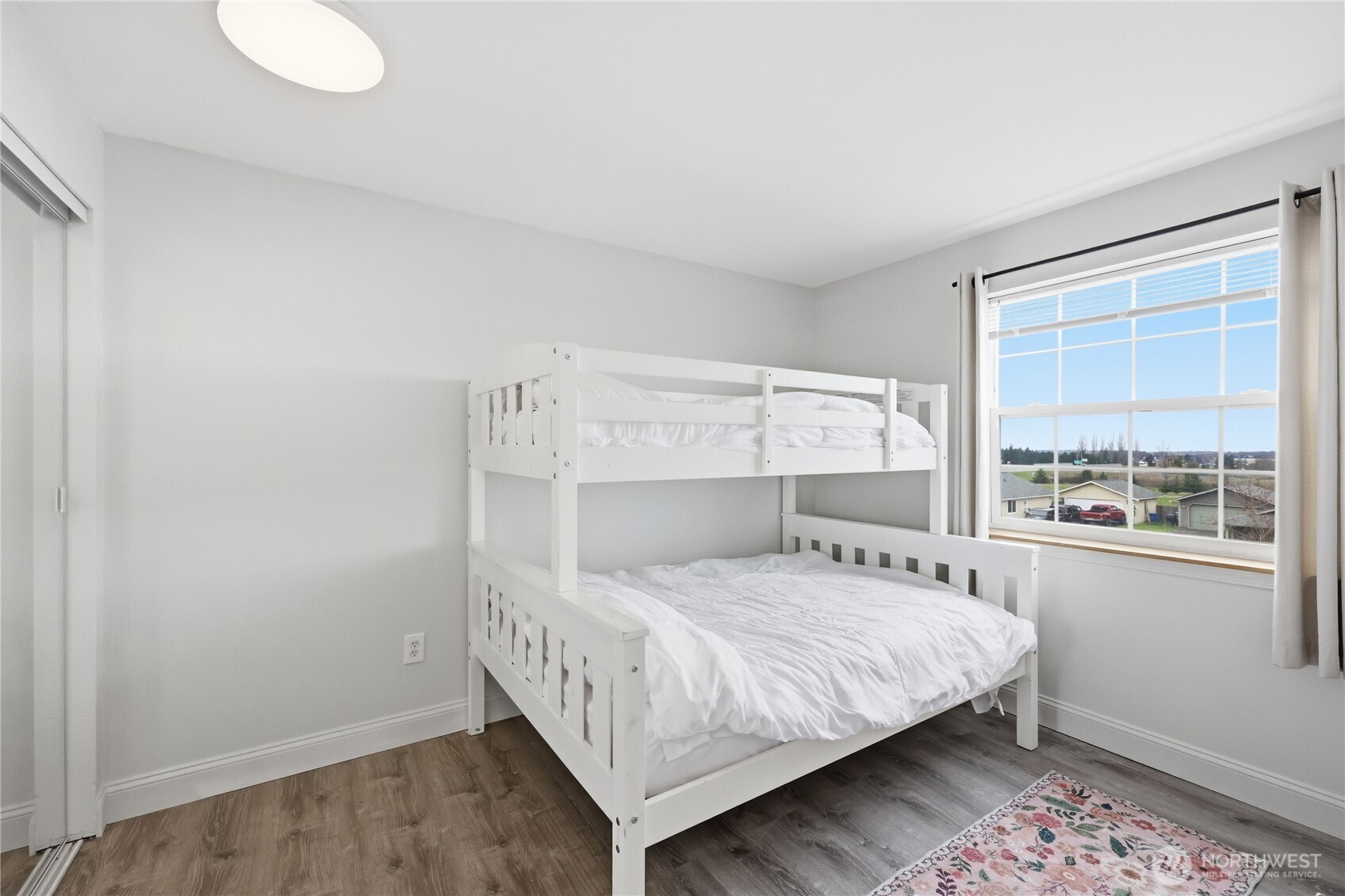 110 Alpine Loop Sequim, WA 98382 - Photo 26 of 36 a bedroom with a bed and window