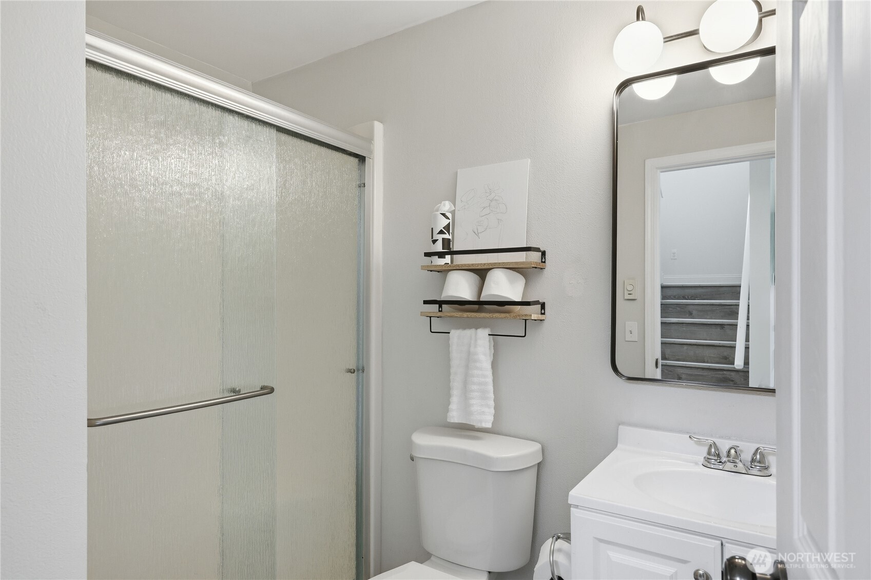 110 Alpine Loop Sequim, WA 98382 - Photo 9 of 36 a bathroom with a toilet sink and shower