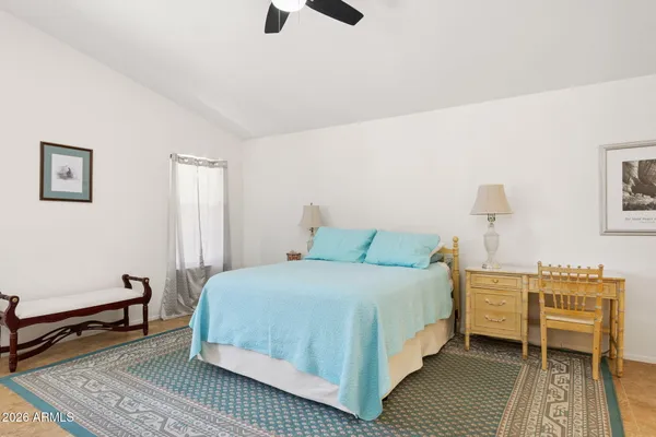 a bathroom with a double vanity sink and mirror