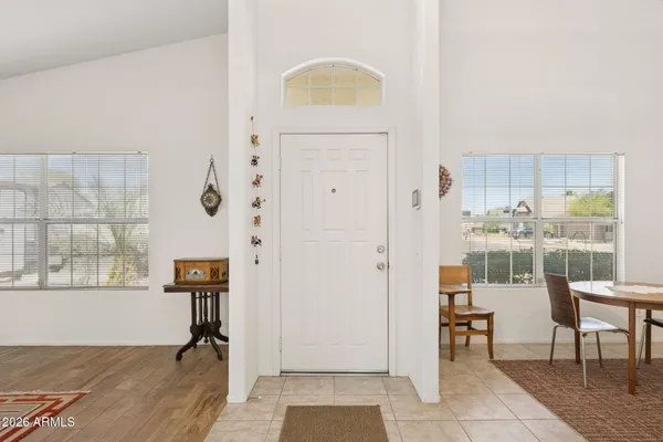 a kitchen with stainless steel appliances a refrigerator and a counter top space