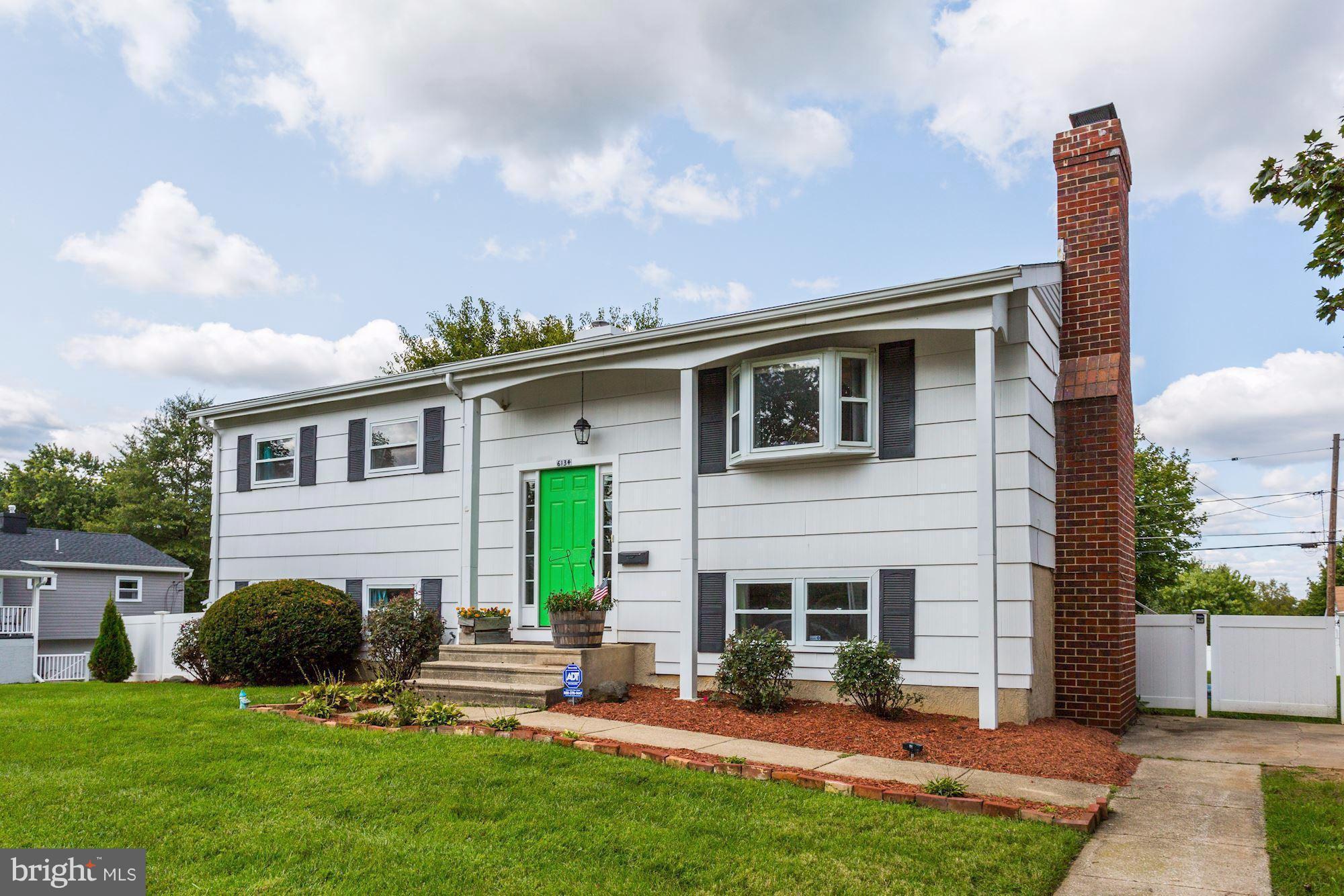 6134 Wheatland Road Baltimore, MD 21228 - Photo 1 of 30 a view of a house with a yard and front view of a house