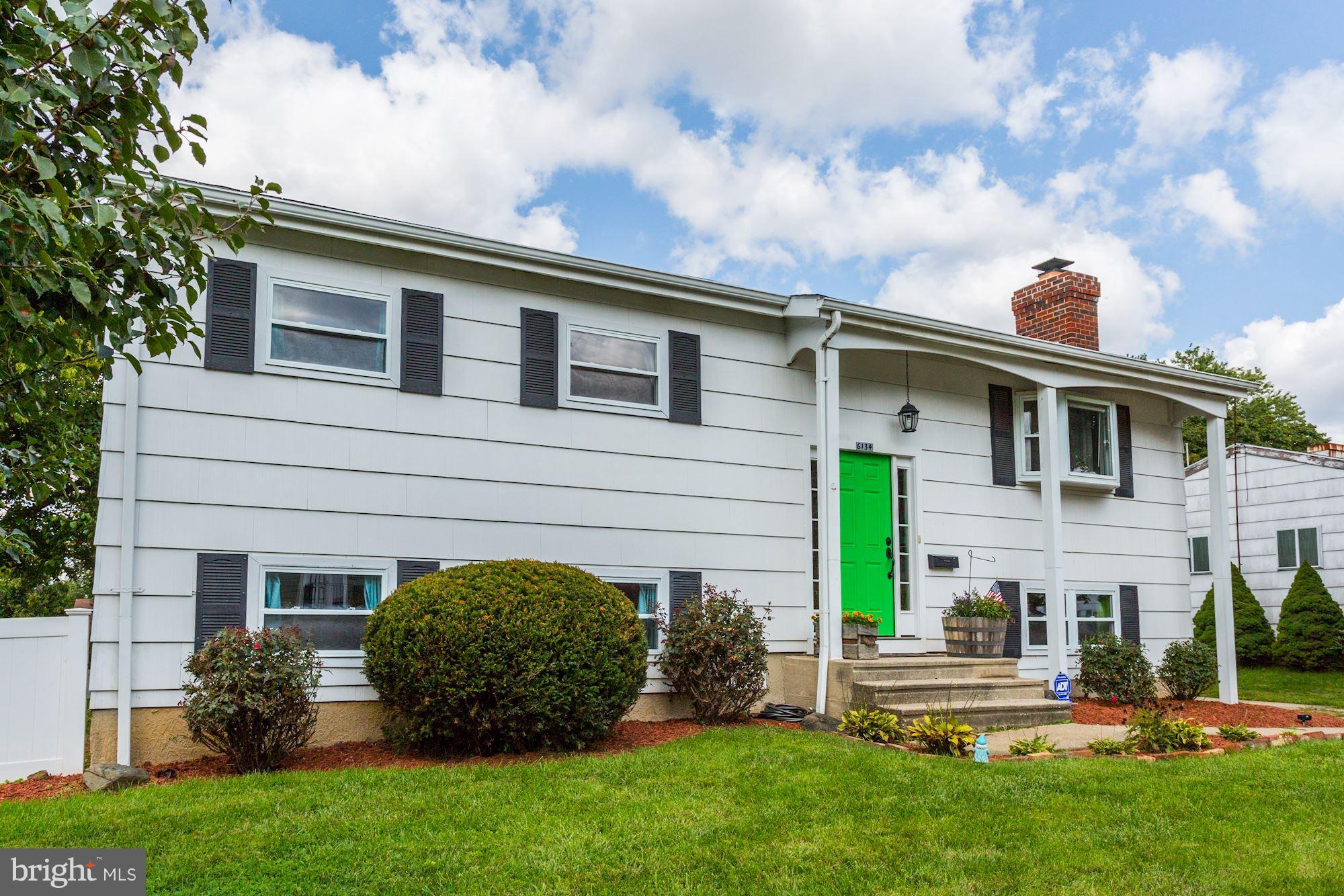 6134 Wheatland Road Baltimore, MD 21228 - Photo 2 of 30 a view of a house with a backyard