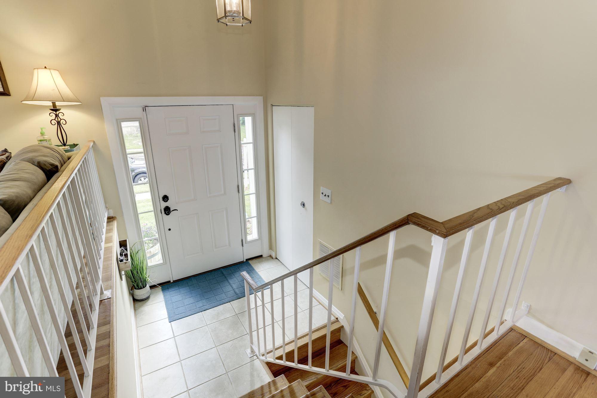 6134 Wheatland Road Baltimore, MD 21228 - Photo 3 of 30 a view of a hallway with stairs