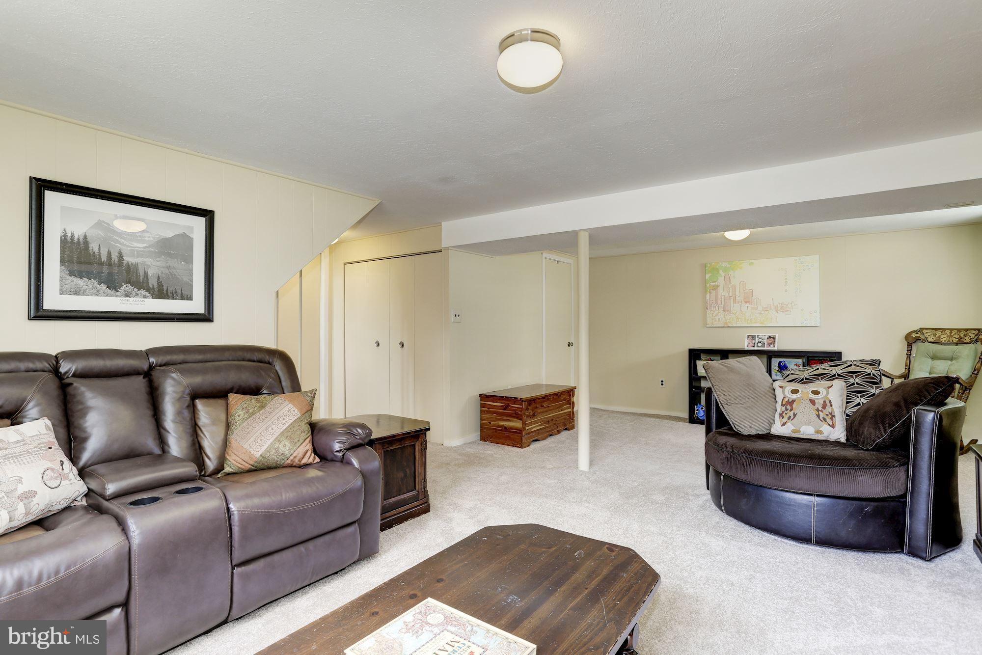 6134 Wheatland Road Baltimore, MD 21228 - Photo 21 of 30 a living room with furniture