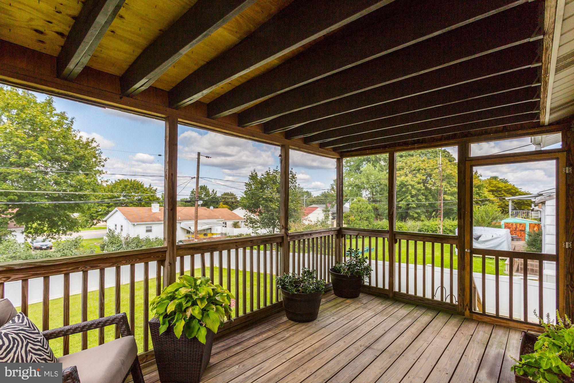 6134 Wheatland Road Baltimore, MD 21228 - Photo 26 of 30 a view of a two chairs in the balcony