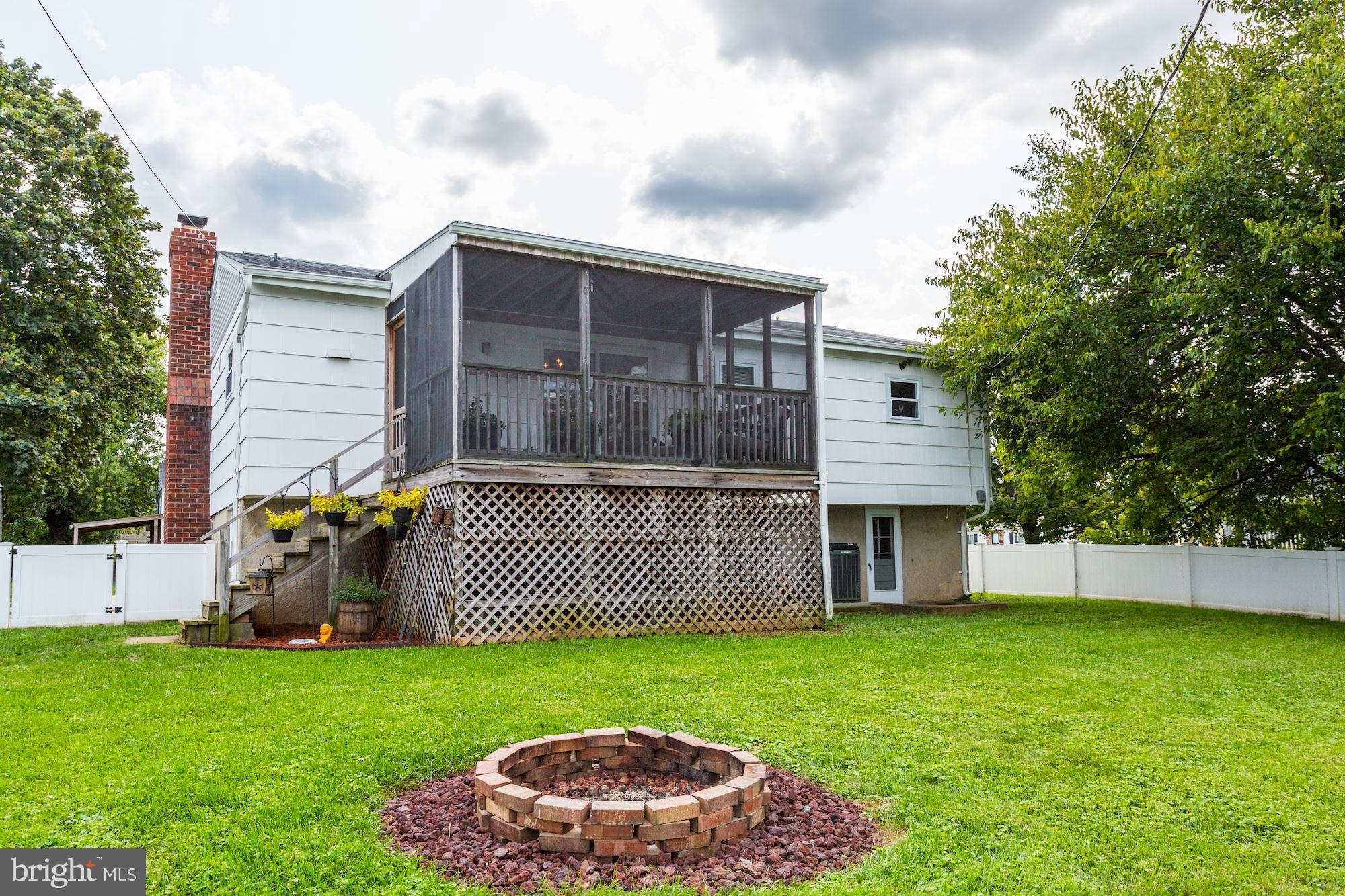 6134 Wheatland Road Baltimore, MD 21228 - Photo 28 of 30 a front view of a house with garden