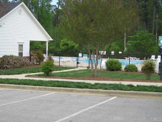 2611 Ivory Run Way, Unit 106 Raleigh, NC 27603 - Photo 9 of 9 a view of a yard in front of a house