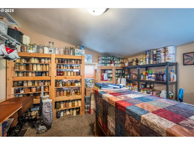 a room with lots of furniture and clutter