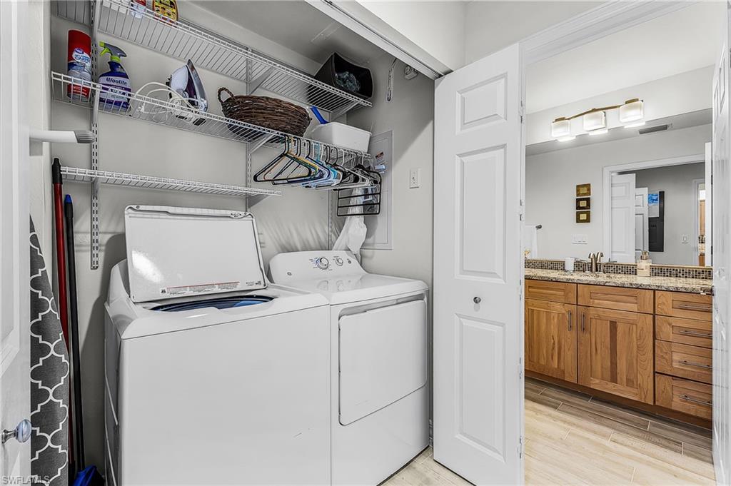 401 Bayfront Place, Unit 3405 Naples, FL 34102 - Photo 15 of 31 a utility room with dryer and washer