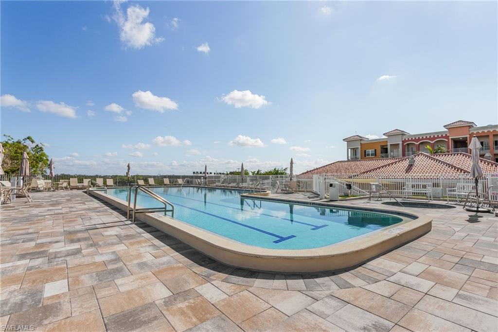 401 Bayfront Place, Unit 3405 Naples, FL 34102 - Photo 27 of 31 a view of a swimming pool with a terrace