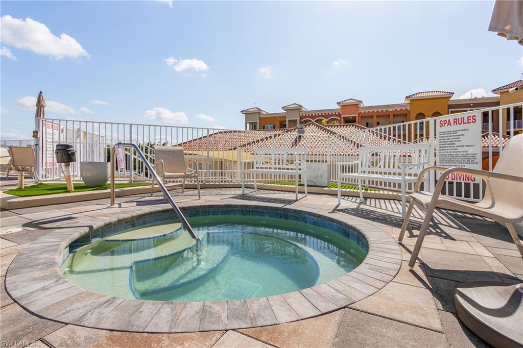 401 Bayfront Place, Unit 3405 Naples, FL 34102 - Photo 28 of 31 a view of a house with swimming pool and sitting area