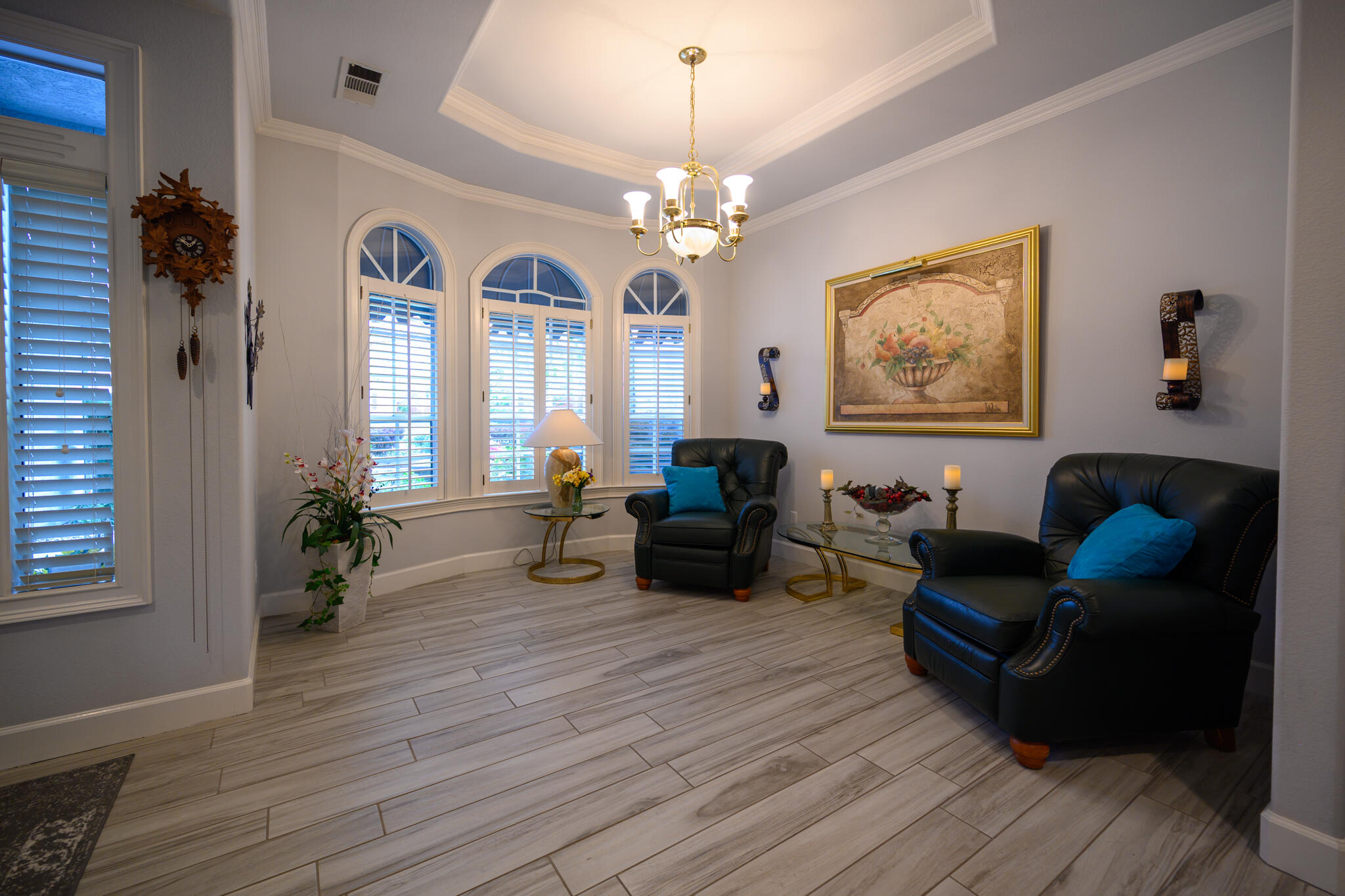 2071 Hope Lane Redding, CA 96003 - Photo 16 of 45 a living room with furniture and a chandelier