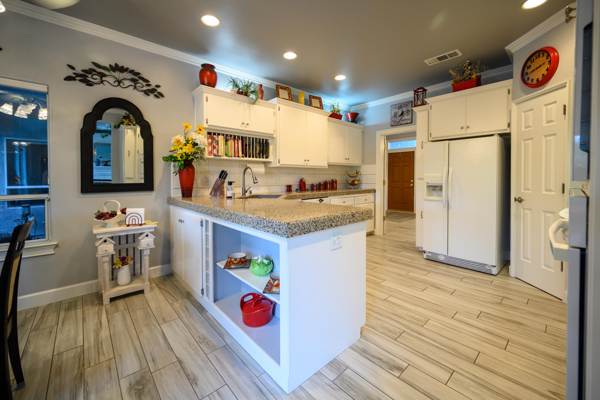 2071 Hope Lane Redding, CA 96003 - Photo 26 of 45 a kitchen with a refrigerator and a stove