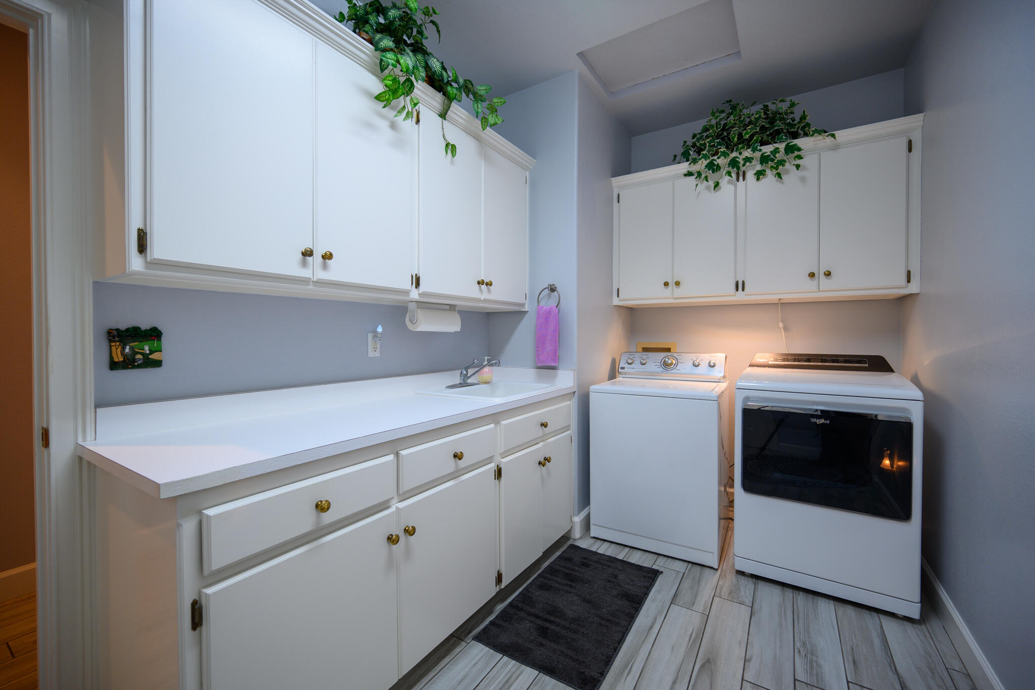 2071 Hope Lane Redding, CA 96003 - Photo 29 of 45 a kitchen with granite countertop white cabinets and white appliances
