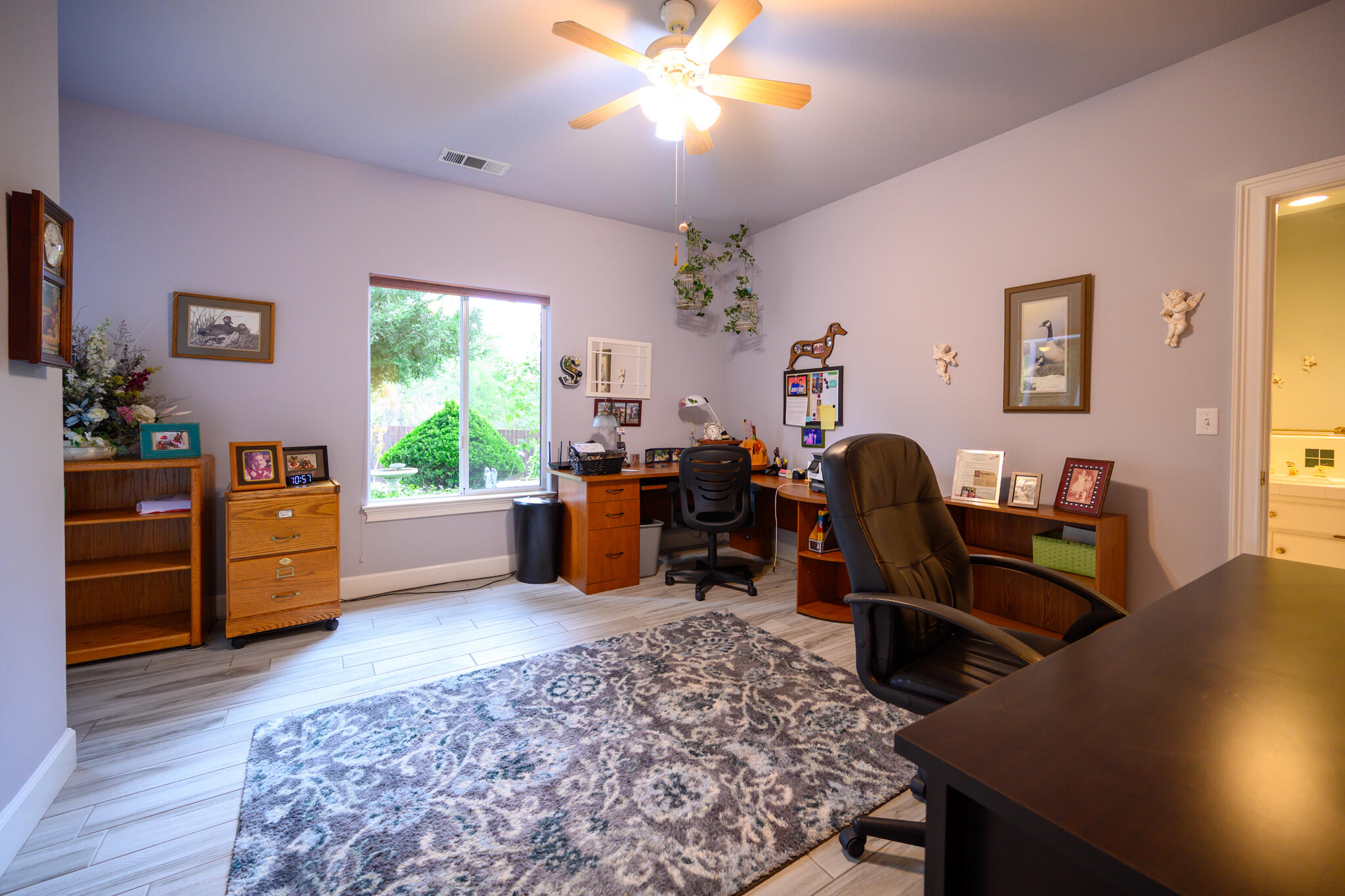 2071 Hope Lane Redding, CA 96003 - Photo 30 of 45 a view of a workspace with furniture and a window