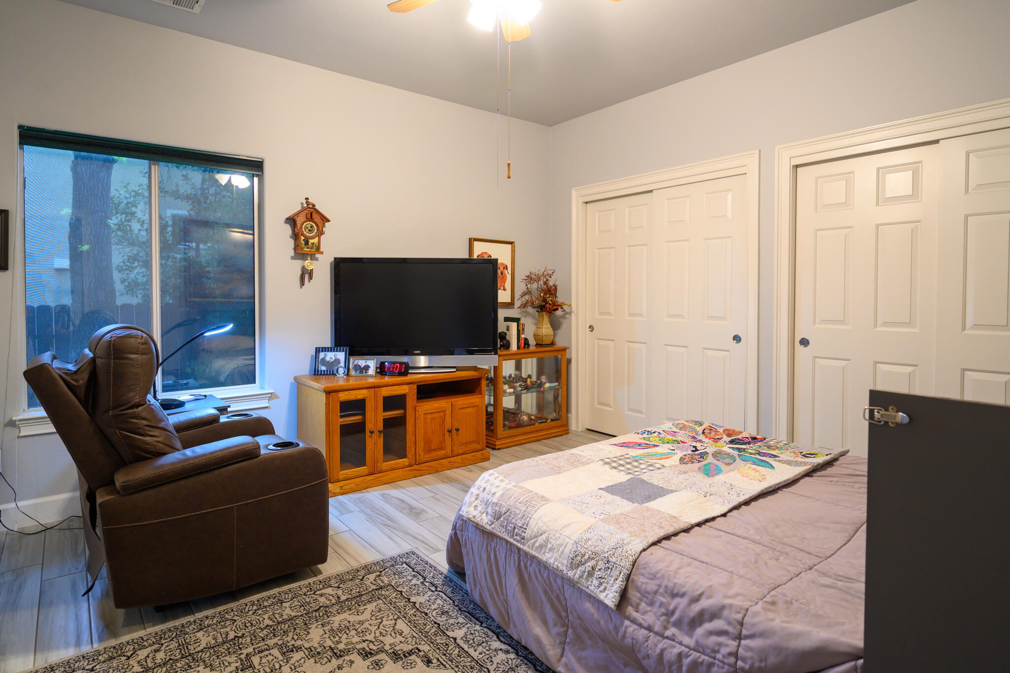 2071 Hope Lane Redding, CA 96003 - Photo 33 of 45 a bedroom with a bed and a flat screen tv