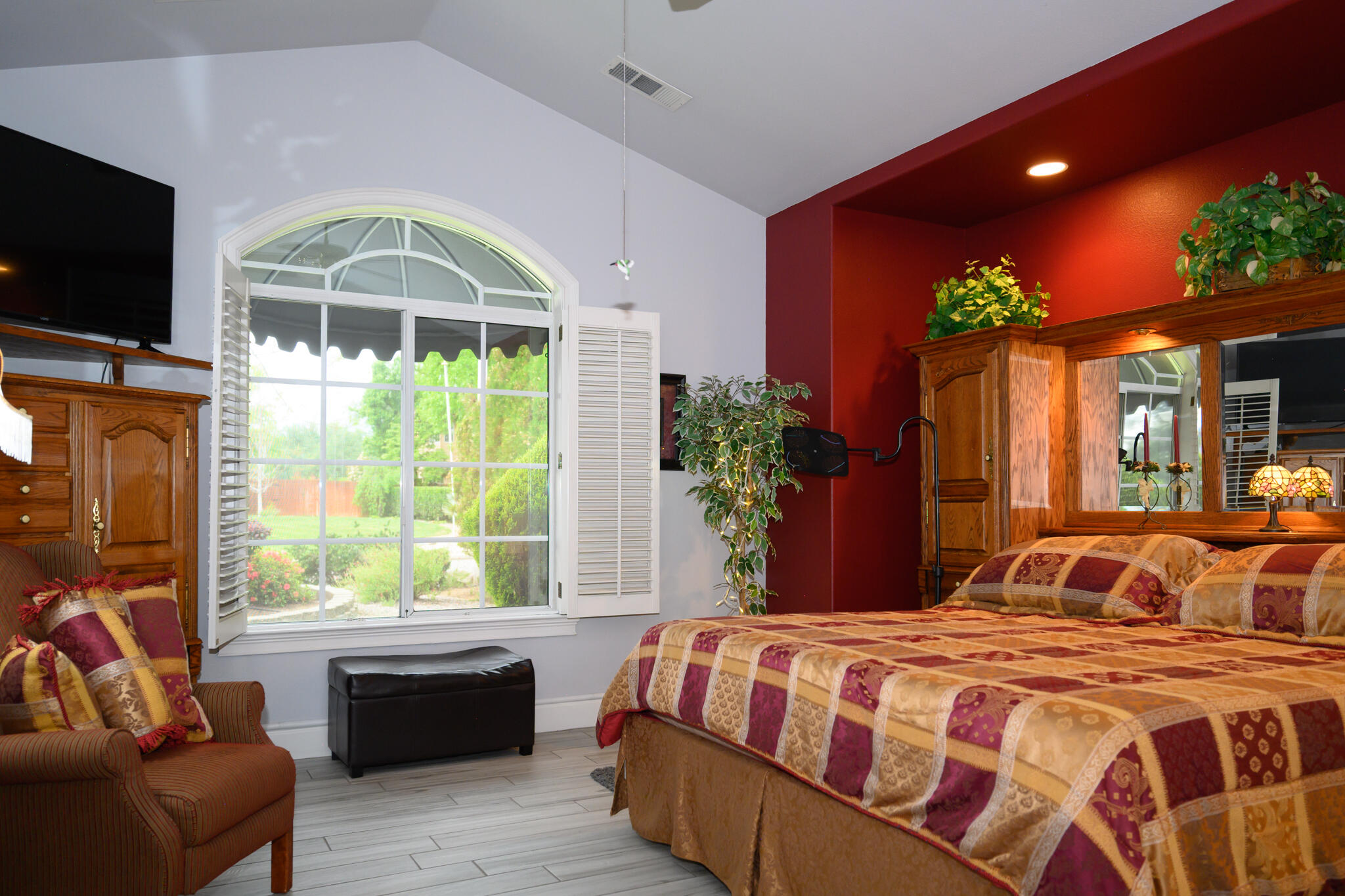 2071 Hope Lane Redding, CA 96003 - Photo 38 of 45 a bedroom with a large bed and a large window