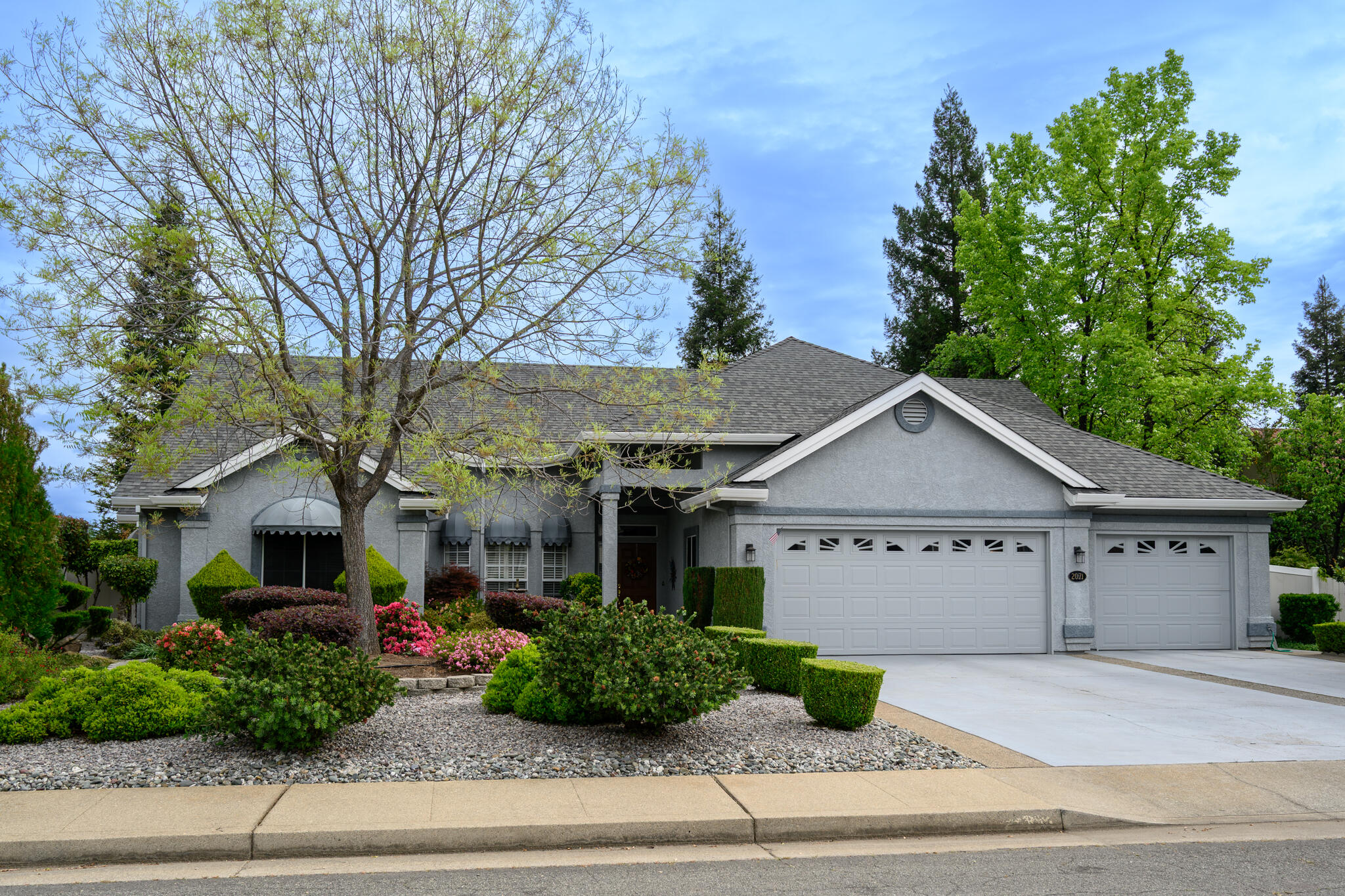 2071 Hope Lane Redding, CA 96003 - Photo 45 of 45 a view of a house with a garden