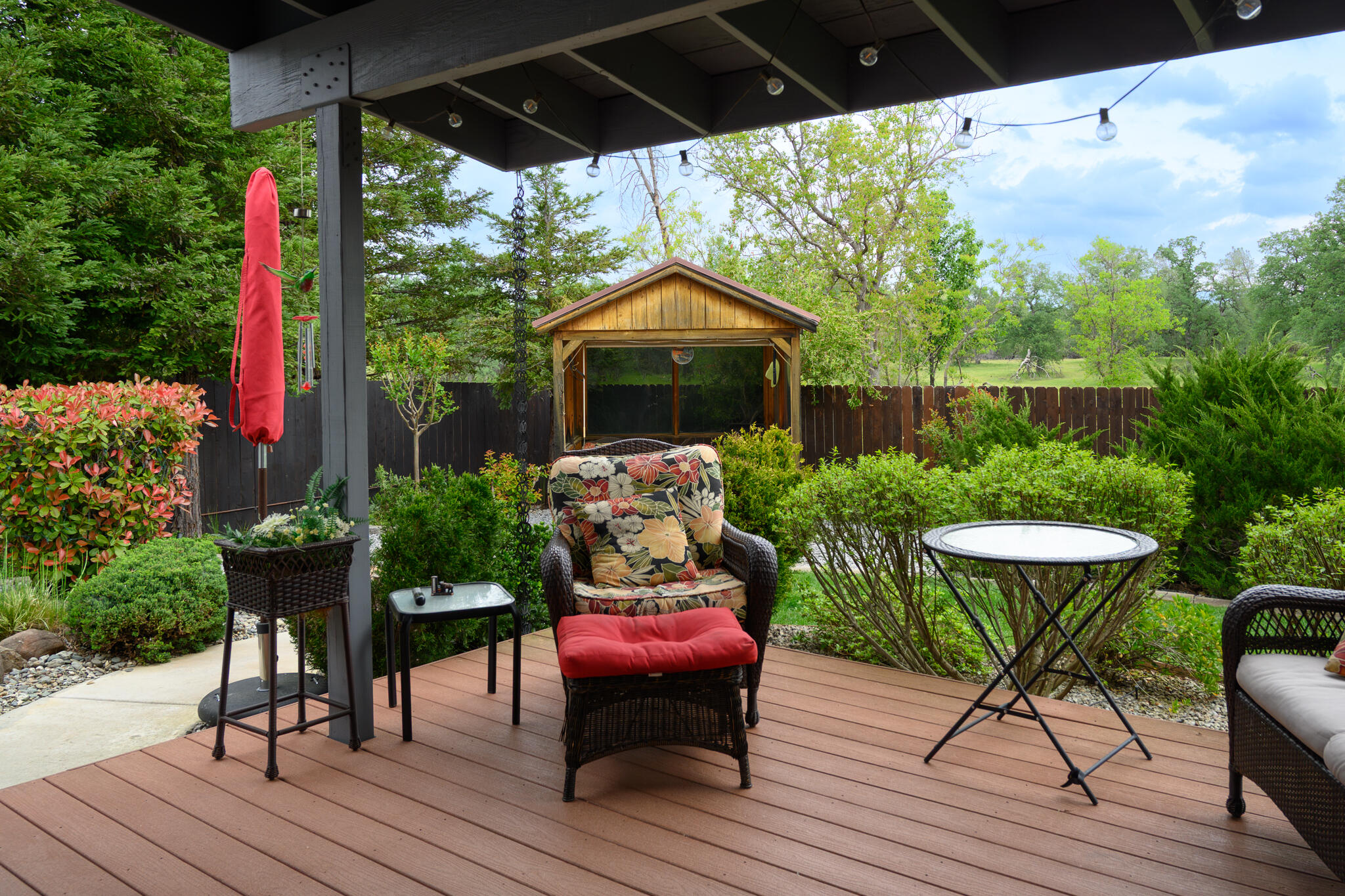 2071 Hope Lane Redding, CA 96003 - Photo 6 of 45 a view of a table and chairs in patio with wooden floor