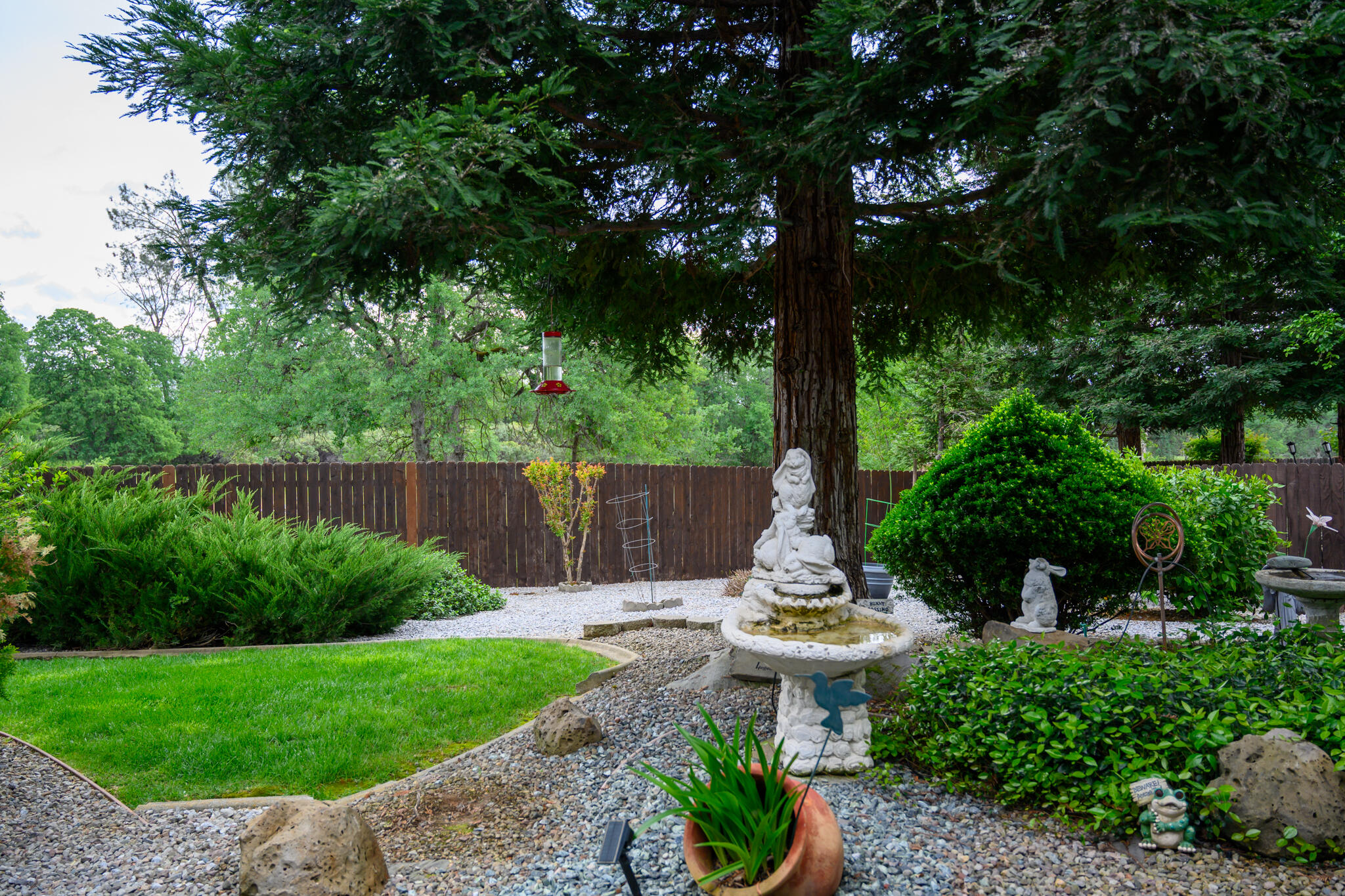 2071 Hope Lane Redding, CA 96003 - Photo 7 of 45 a view of a chair and table in the garden