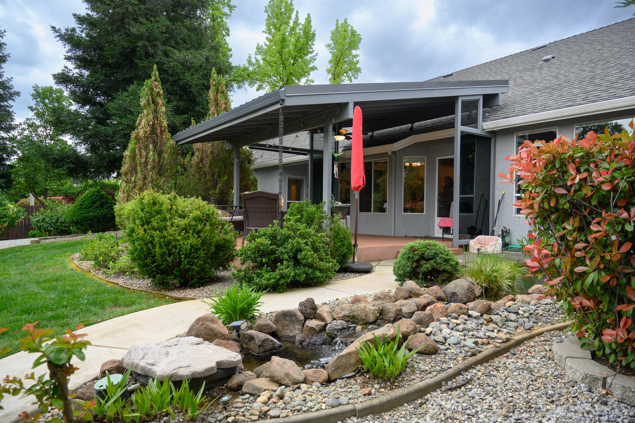 2071 Hope Lane Redding, CA 96003 - Photo 10 of 45 front view of a house with a yard