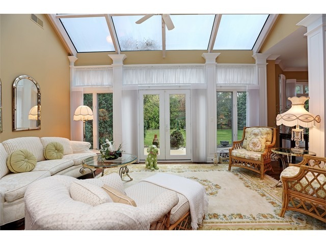 6350 Clarendon Hills Road Willowbrook, IL 60527 - Photo 21 of 25 a bedroom with furniture and a large window