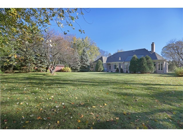 6350 Clarendon Hills Road Willowbrook, IL 60527 - Photo 22 of 25 a view of a house with a yard