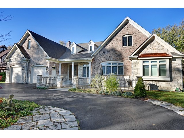 6350 Clarendon Hills Road Willowbrook, IL 60527 - Photo 24 of 25 a front view of a house with a yard