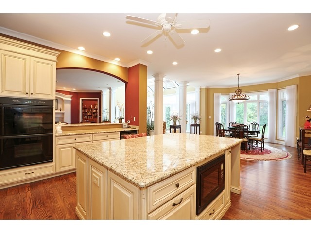 6350 Clarendon Hills Road Willowbrook, IL 60527 - Photo 6 of 25 a kitchen with a stove a sink and a microwave