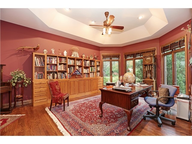 6350 Clarendon Hills Road Willowbrook, IL 60527 - Photo 9 of 25 a living room with furniture and a large window