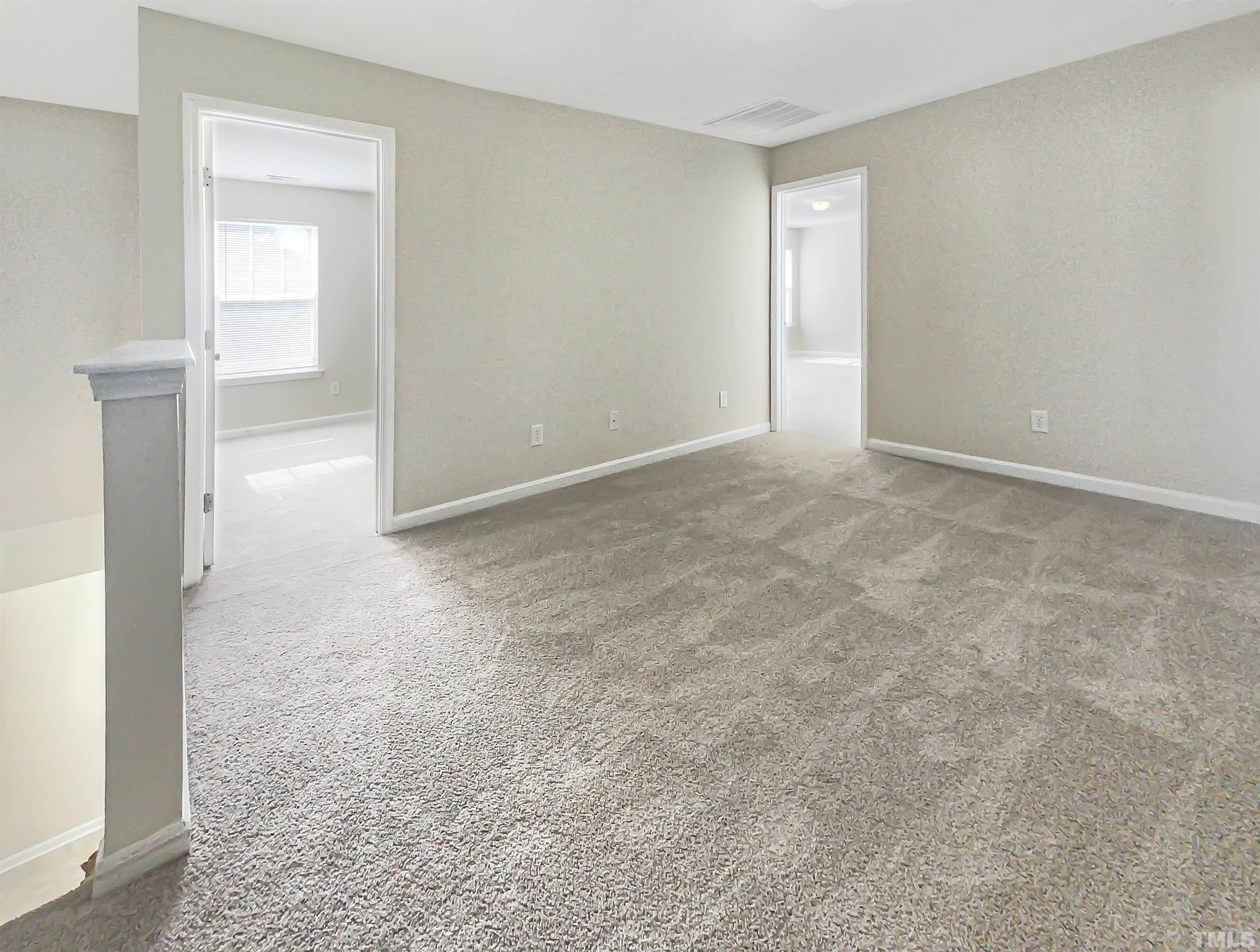 3501 Pinkham Way Raleigh, NC 27616 - Photo 14 of 20 an empty room with a natural light