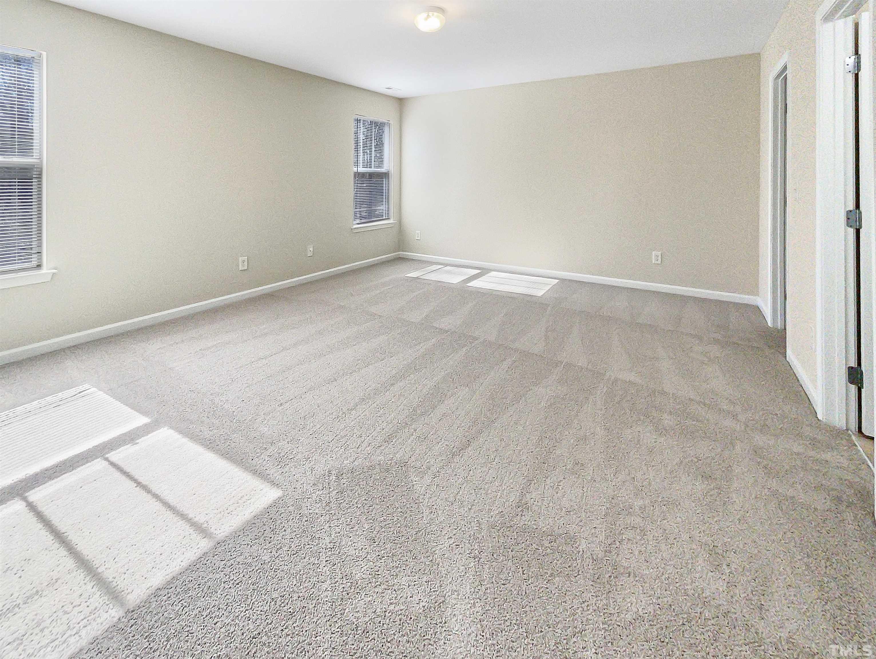 3501 Pinkham Way Raleigh, NC 27616 - Photo 16 of 20 an empty room with windows