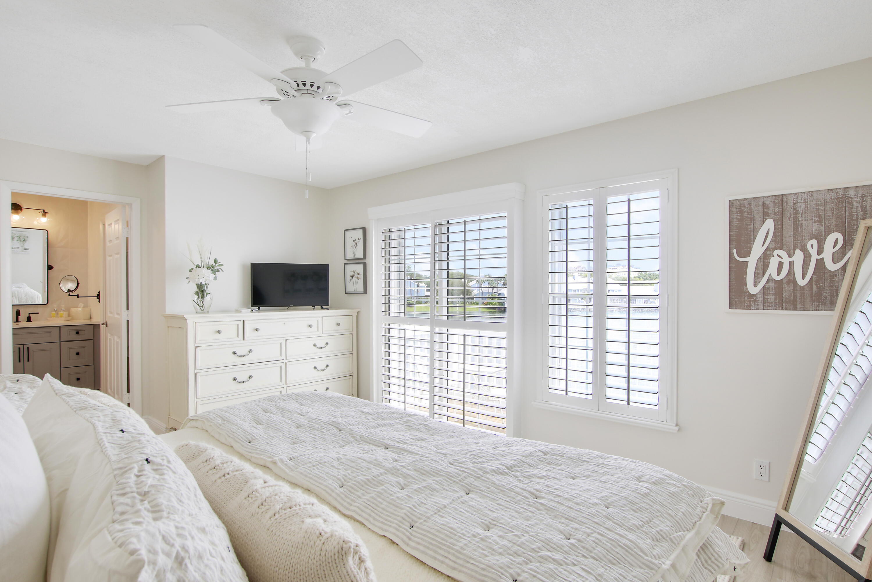 1219 Ocean Dunes Circle Jupiter, FL 33477 - Photo 9 of 23 Primary Bedroom Suite