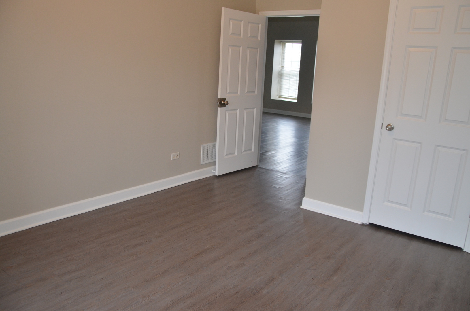 2026 North 3372nd Road, Unit 503 Ottawa, IL 61350 - Photo 31 of 49 a view of a hallway with wooden floor