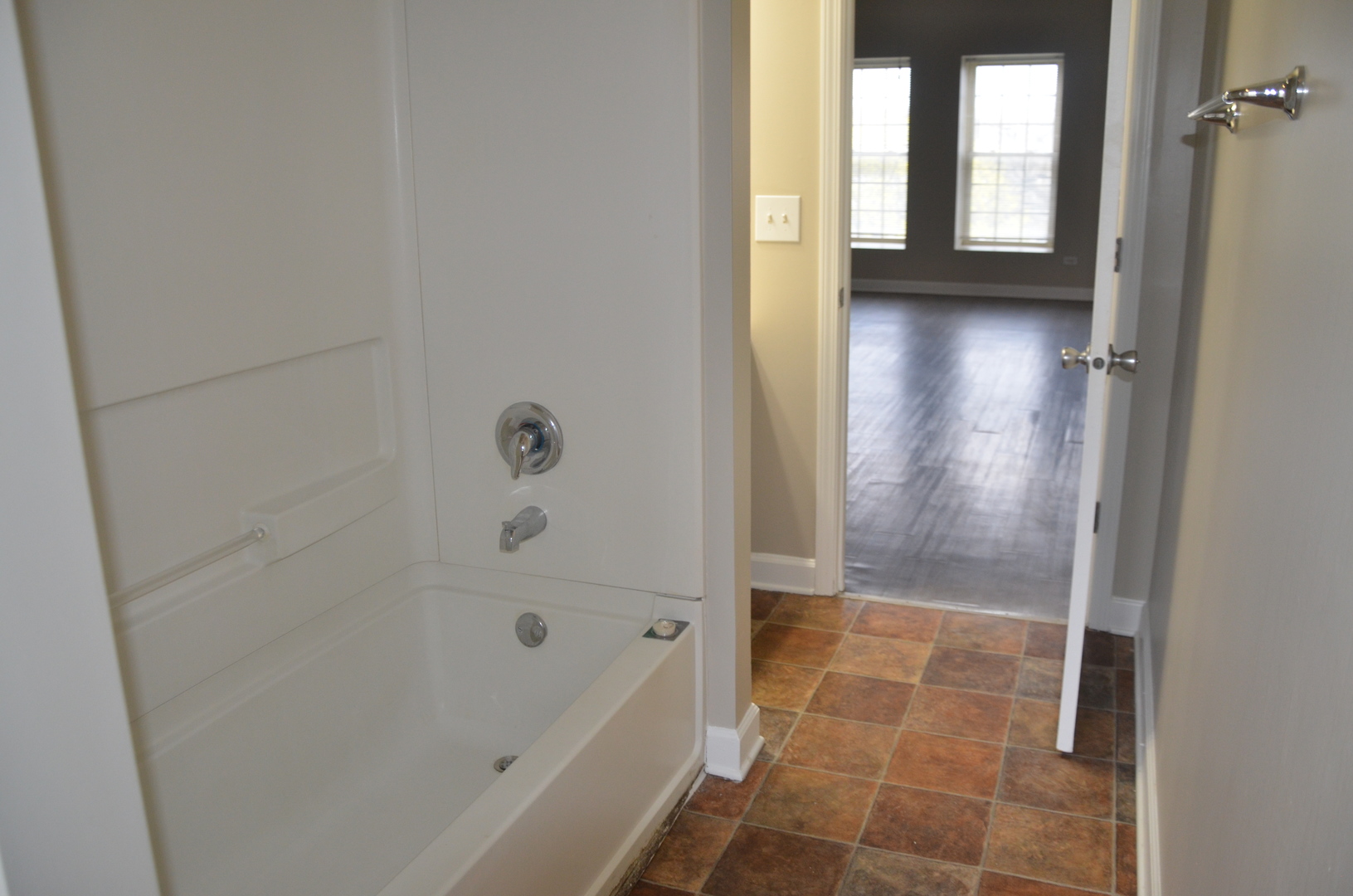 2026 North 3372nd Road, Unit 503 Ottawa, IL 61350 - Photo 33 of 49 a bathroom with a bathtub and shower