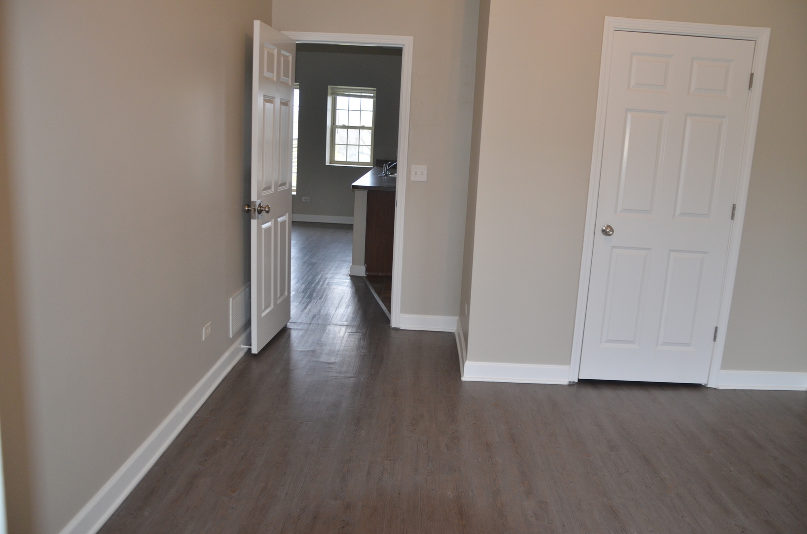 2026 North 3372nd Road, Unit 503 Ottawa, IL 61350 - Photo 34 of 49 a view of a hallway with wooden floor