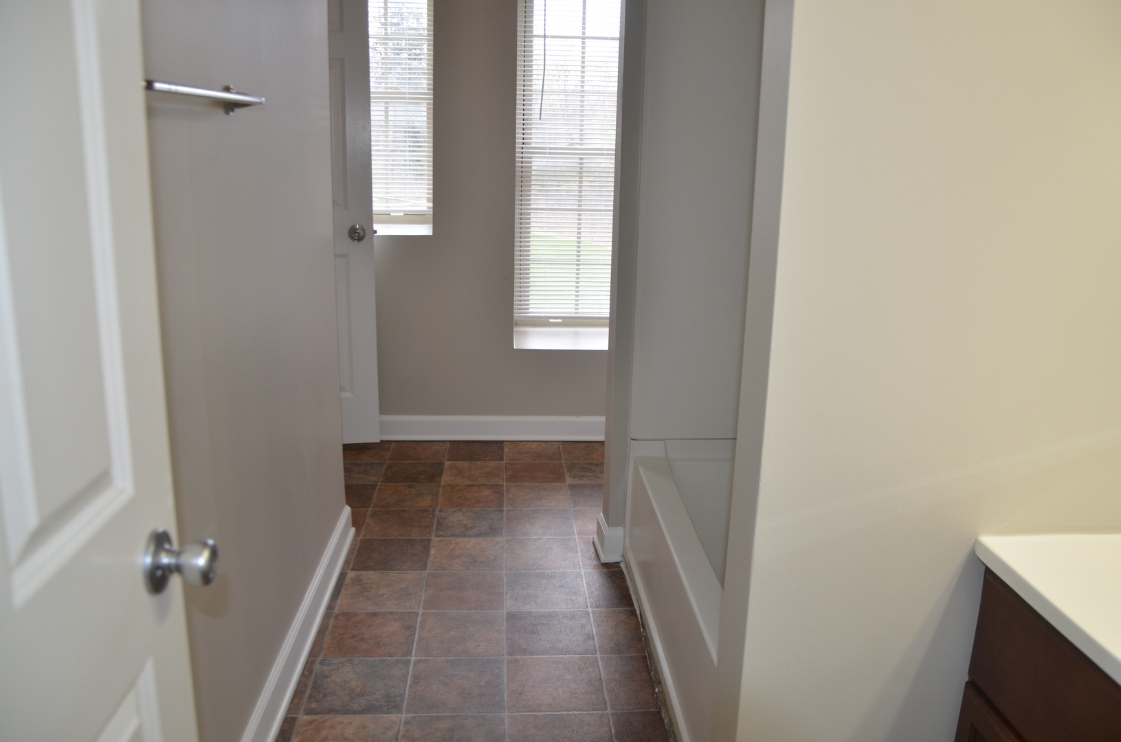 2026 North 3372nd Road, Unit 503 Ottawa, IL 61350 - Photo 35 of 49 a view of a bathroom from a hallway