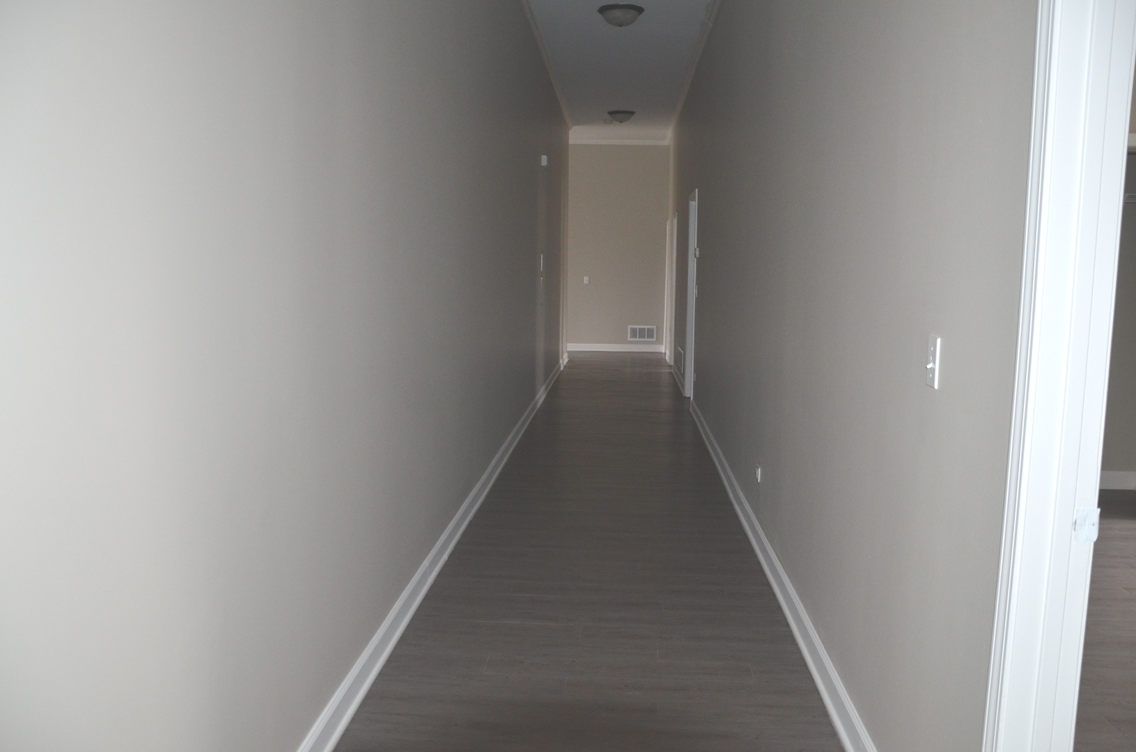 2026 North 3372nd Road, Unit 503 Ottawa, IL 61350 - Photo 46 of 49 a view of a hallway with wooden floor