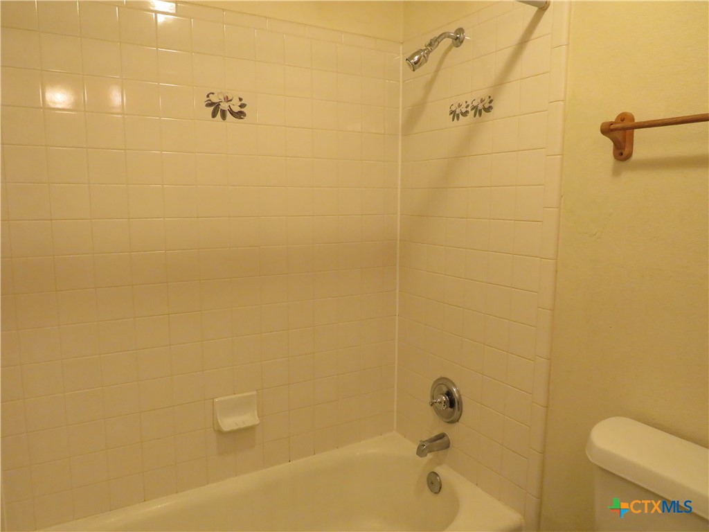 8221 Sam Rayburn Drive, Unit 103 Austin, TX 78753 - Photo 10 of 15 a bathroom with a shower