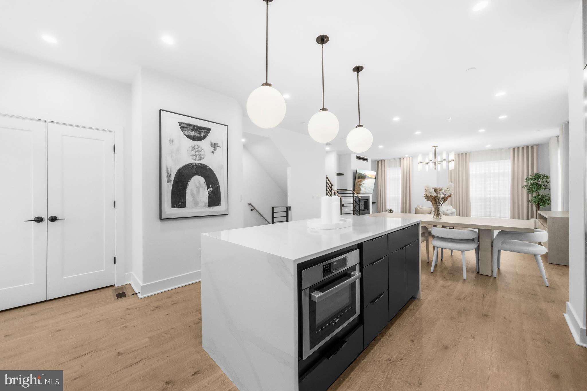 2040 Tysons Ridgeline Road Falls Church, VA 22043 - Photo 14 of 56 a kitchen that has a lot of cabinets in it