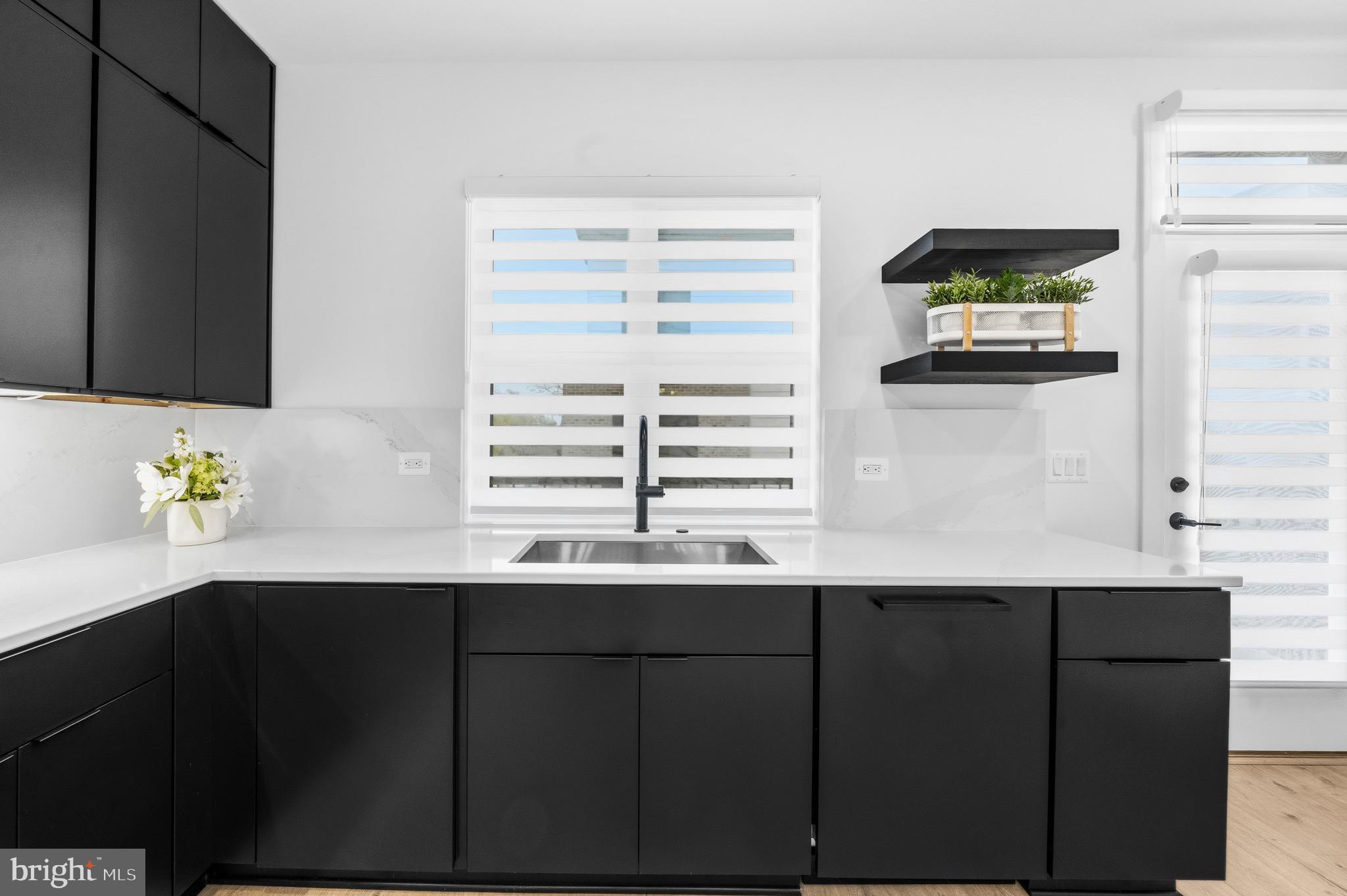 2040 Tysons Ridgeline Road Falls Church, VA 22043 - Photo 18 of 56 a kitchen with a sink and a window