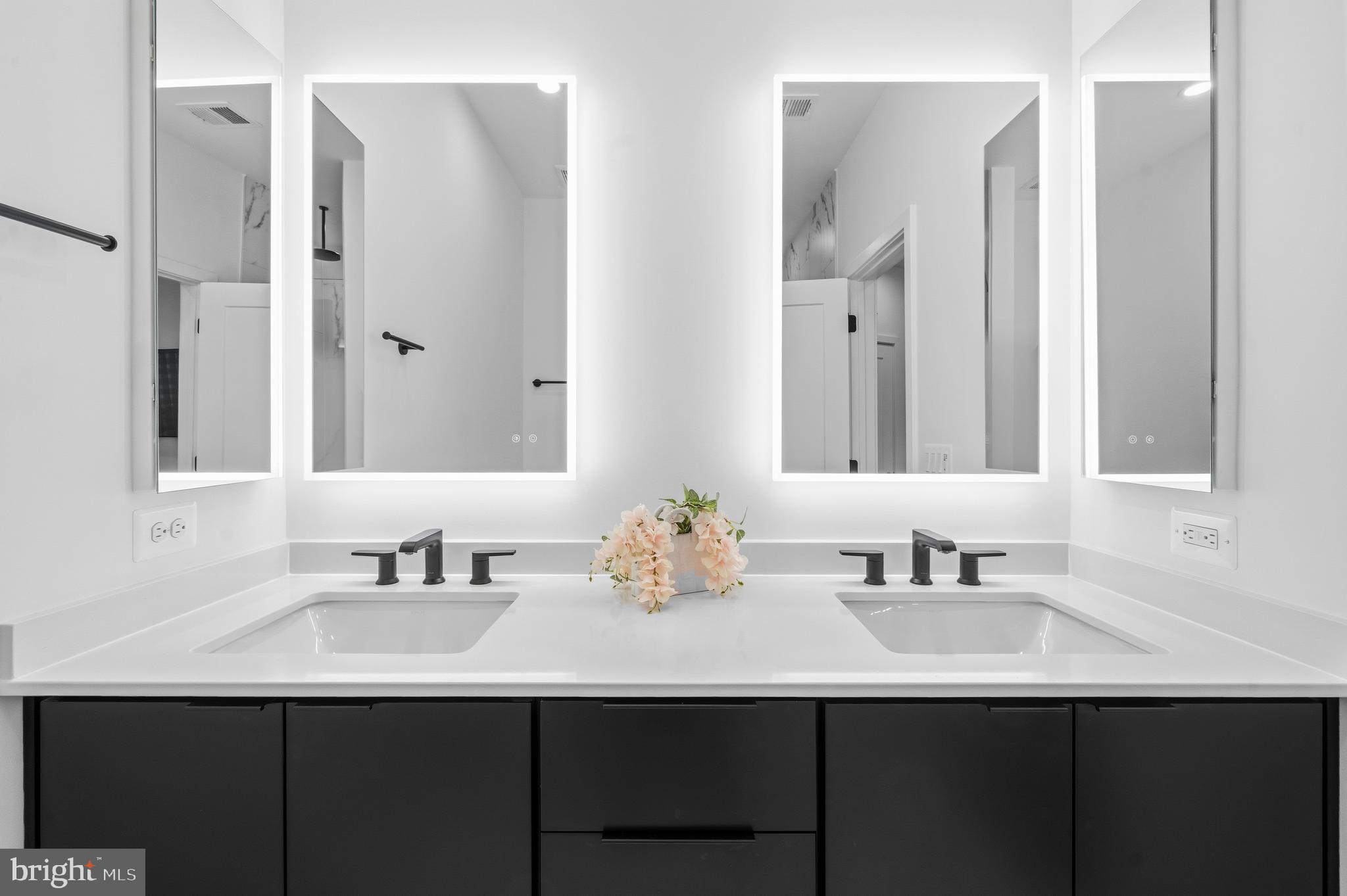 2040 Tysons Ridgeline Road Falls Church, VA 22043 - Photo 25 of 56 a bathroom with double sink and two mirror